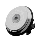 A upper bearing cover and Works Components branded top-cap in shiny anodised silver with a black seal designed to work with all our angle and reach headsets.