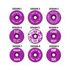 A headset top-cap in shiny anodised purple with multiple different written designs